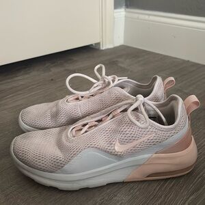 Pink Nike air running shoes